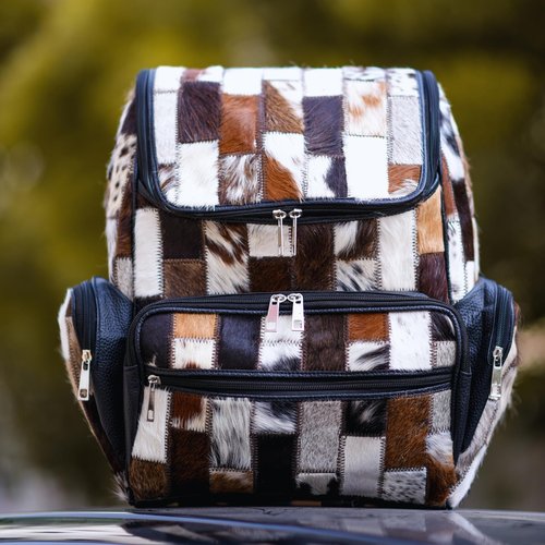 CHAYELL Small Cowhide Backpack for Women & Men, Water-Resistant with Reinforced Stitch, Reliable Travel Partner for Flight, Road Trip, & Outdoor Adventure, Stylish Leather Cowhide Diaper Bag Backpack