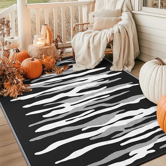 GENIMO Outdoor Rug for Patio Clearance, 6'x9' Waterproof Camping Mat, Reversible Plastic Straw Rugs for RV, Camper, Balcony, Backyard, Picnic, Deck (Black&White)
